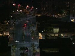 Aerial TS Rodeo Drive to Regent Beverly Wilshire Hotel / Beverly Hills, California, United States Stock Footage