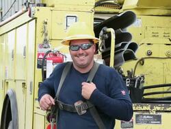 MS Portrait of Smiling Electrical Utility Worker in Saftey Gear / Oyster, Virginia, USA Stock Footage