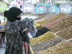 MS Woman buying dry fruits in  market / Taroudant, Unspecified, Morocco Stock Footage