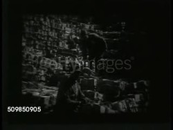 Japanese watching Newsreel Instructional Video