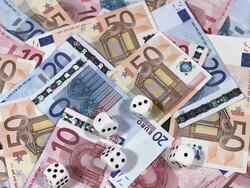 MS SLO MO Game of 5 White Dices on pile of euro bills / vieux pont en auge, Normandy, France Stock Footage