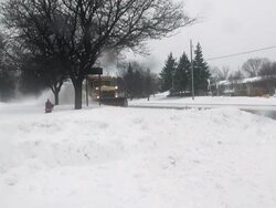 Winter snowstorm. Car traffic on slippery road. Snowplow. Stock Footage