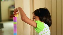 Girl Exploring Block Toys Stock Footage