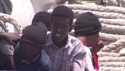 Migrants on Italian Coastguard Ship in Lampedusa News Clip