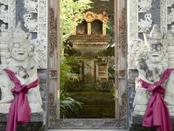 MS Temple guardian in front of house entrance door like temple / Ubud, Bali, Indonesia    Stock Footage