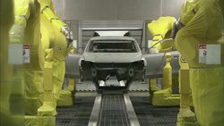 Robots operate in an automotive factory. Stock Footage
