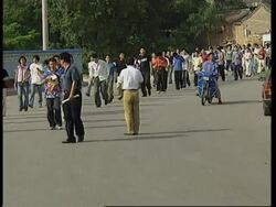 Students undergo screening for SARS before taking exams News Clip