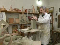 HD DOLLY: Sculpture Artist Making Clay Statue Stock Footage