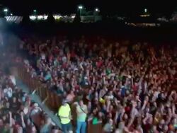 WS TU CS Crowd cheering at outdoor night rock concert / Oshkosh, WI, USA Stock Footage