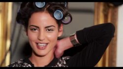 A woman with her hair in rollers Stock Footage