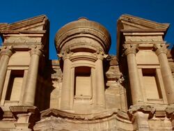 T/L, LS, sunset on El Deir (Monastery) at ancient stone city of Petra / Jordan Stock Footage