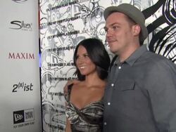 Olivia Munn, Tristen Eaton at the 2011 Maxim Hot 100 Party With New Era, Miller Lite, 2(x)ist And Silver Jeans Co. at Hollywood CA. (Footage by WireImage Video/GettyImages) Stock Footage
