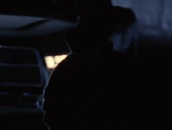  CU Cowboy in front of car with his head down / Tejon Ranch, California, USA Stock Footage