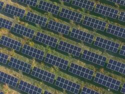 MS AERIAL View of solar power plant through nature / Siena, Tuscany, Italy Stock Footage