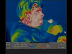 Thermographic imaging, CU man smoking cigarette Stock Footage