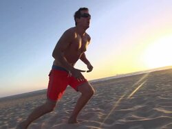 Men playing beach volleyball. - Slow Motion - filmed at 240 fps Stock Footage