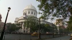 Traffic passes the General Post Office in the BBD Bagh area of Calcutta. Stock Footage