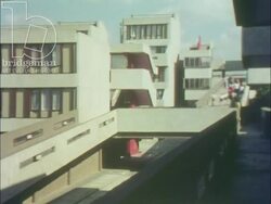 Living at Thamesmead, 1973, part 14 - Couple walk around the estate and visit the information centre Stock Footage