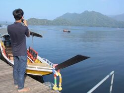 close up : young man take a photo on lake Stock Footage