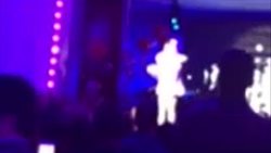 Mobile phone footage of MadonnaÃ¢Â€Â™s Miami performance; says sheÃ¢Â€Â™s Ã¢Â€Â˜ashamed to be an American.Ã¢Â€Â™ Instructional Video