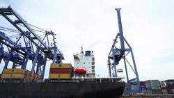 Shipyard working loading container cargo freight ship at sea Stock Footage