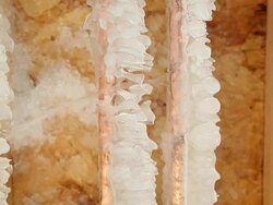 Frozen Cracked Copper Water Pipe Leaking into House Basement Stock Footage