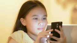 Close up of a young asian girl using smart phone Stock Footage