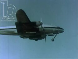 Young lady looks out window as the BOAC plane lands c.1960 Stock Footage
