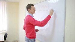 Professor writes on white board and teaching Stock Footage