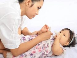 Mother is measuring temperature's her baby Stock Footage