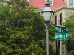 MS Shot of Charleston South Carolina street signs at Meeting Street and Water Street / Charleston, South Carolina, United States Stock Footage