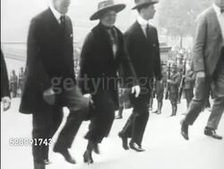 1919: PRESIDENTIAL EVENTS: 28th President Woodrow Wilson (1856-1924) walking w/ wife, First Lady, Edith Bolling Wilson (1872-1961) up steps at ceremony. 1920: Woodrow Wilson being helped to stand in doorway (recovering from stroke). Instructional Video