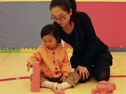 MS Shot of mother and daughter playing building blocks in playroom / Xian, China Stock Footage