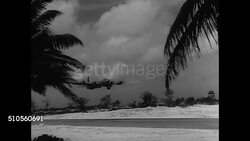 1946: DELIVEREY METHOD &amp; TARGET: B-29 Superfortress four-engine bomber talking off from tropical location. Slightly faded New York City skyline (POV on bridge looking toward South Street Seaport across East River). Instructional Video