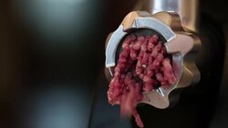 Meat grinder closeup, preparation of forcemeat at home. Stock Footage