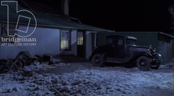 A run-down country home in the night, 1930s - reenactment Stock Footage