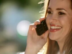 HD: Young Woman Talking On The Phone Stock Footage