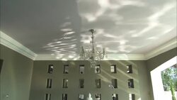 Shimmering light reflects off the ceiling of a dining room at La Maison Hotel. Stock Footage