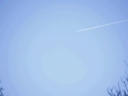 Airplane flying over blue sky. Stock Footage