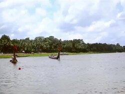 WS Shot of people rowing snake boats in race during onam festival /  Aranmula, Kerala, India Stock Footage