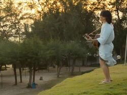 side view : crazy man play guitar Stock Footage