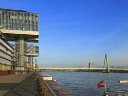 WS LA Shot of Modern buildings at Rheinau Halbinsel with Rhine river / Cologne, North Rhine Westphalia, Germany Stock Footage