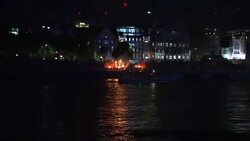A sculpture marking the Great Fire of London set alight on the Thames News Clip
