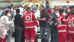 Migrants disembark HMS Bulwark in Catania News Clip