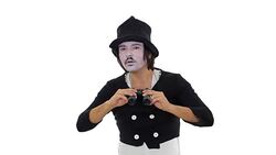 Mime artist looking through a binocular. Stock Footage