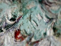 Abstract rotating painting with golden glitter Stock Footage