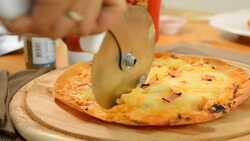 Hawaiian pizza served on a wooden tray Photo Brown. Stock Footage
