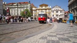 Red trams pass through the city of Prague. Stock Footage