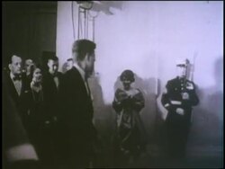 U.S. President John F. Kennedy and First Lady Jacqueline Kennedy attend a White House party. News Clip