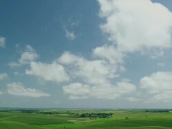 Beautiful sky scape and green farm fields Stock Footage
